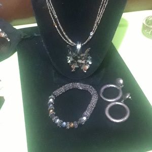 Necklace pendant matching bracelet and earrings
